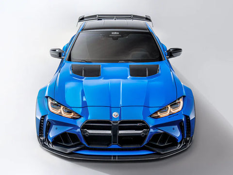 Bright blue BMW M4 with aggressive body kit and ADRO carbon fiber vented hood.